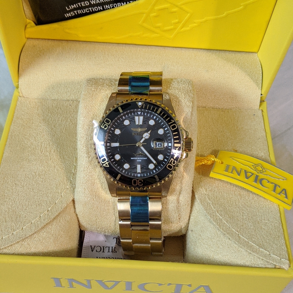 Men's New Invicta watch.